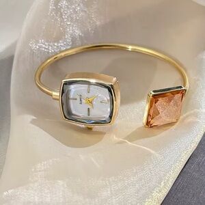 Anthropologie Gold Cuff Watch with Peach Crystal Accent